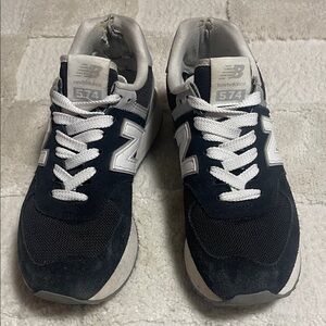 Women’s New Balance 574 Black and White Sneakers